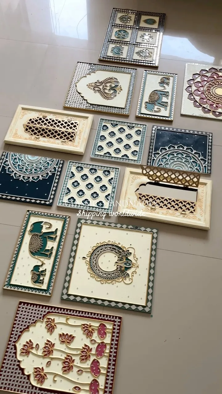 Thirteen lippan artworks laid out together